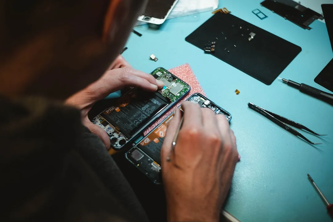Professional technician repairing a desktop computer
