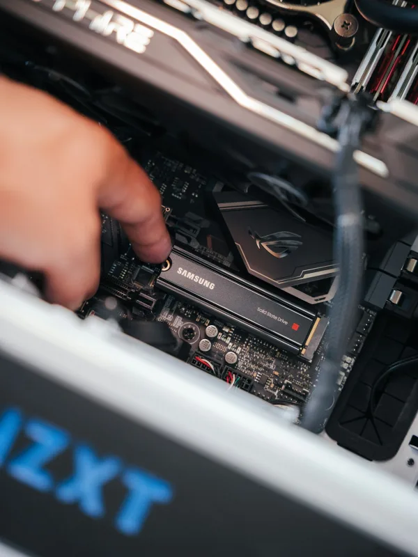 Sheffield technician installing DDR5 RAM into PC motherboard