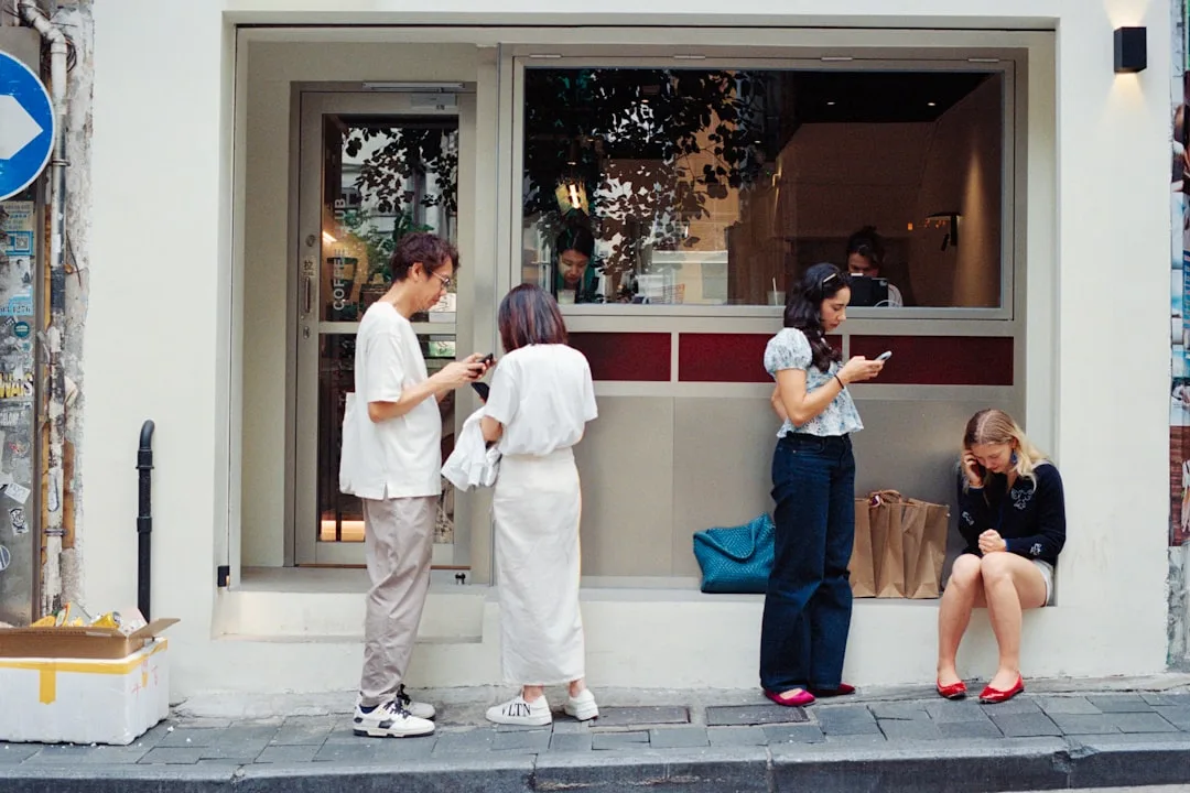 person using smartphone on street