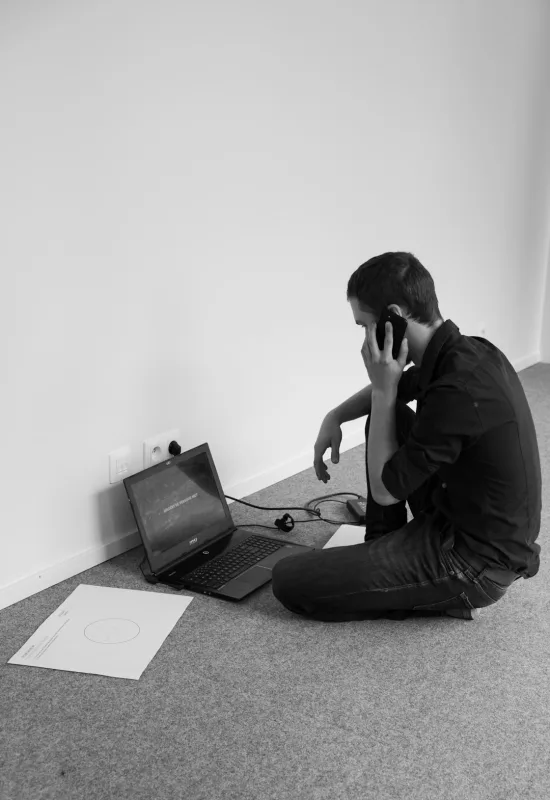 technician listening to laptop clicking sound