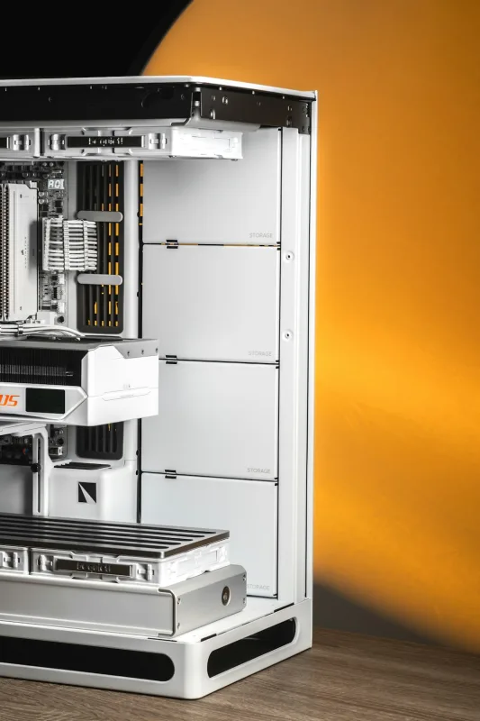 PS5 internal drive area opened on a workbench