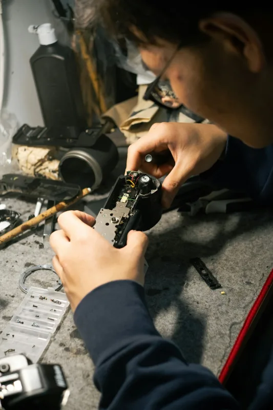 technician repairing gaming console