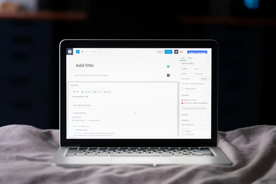 laptop displaying WordPress admin panel and custom code tabs