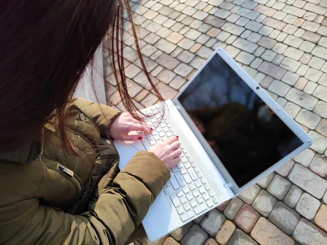 person using a clean modern laptop